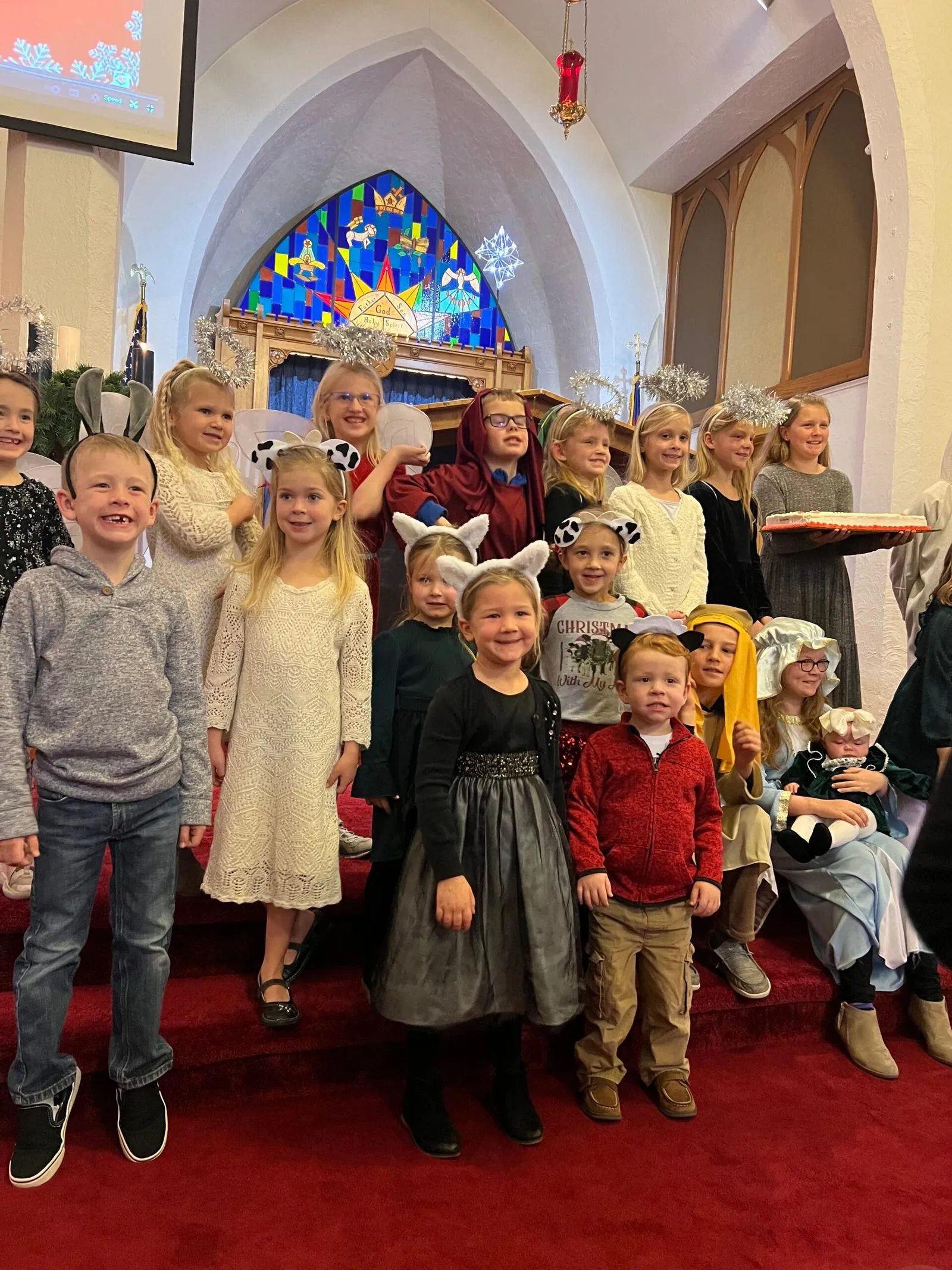 Children in costume gathered in the sanctuary for a Christmas program