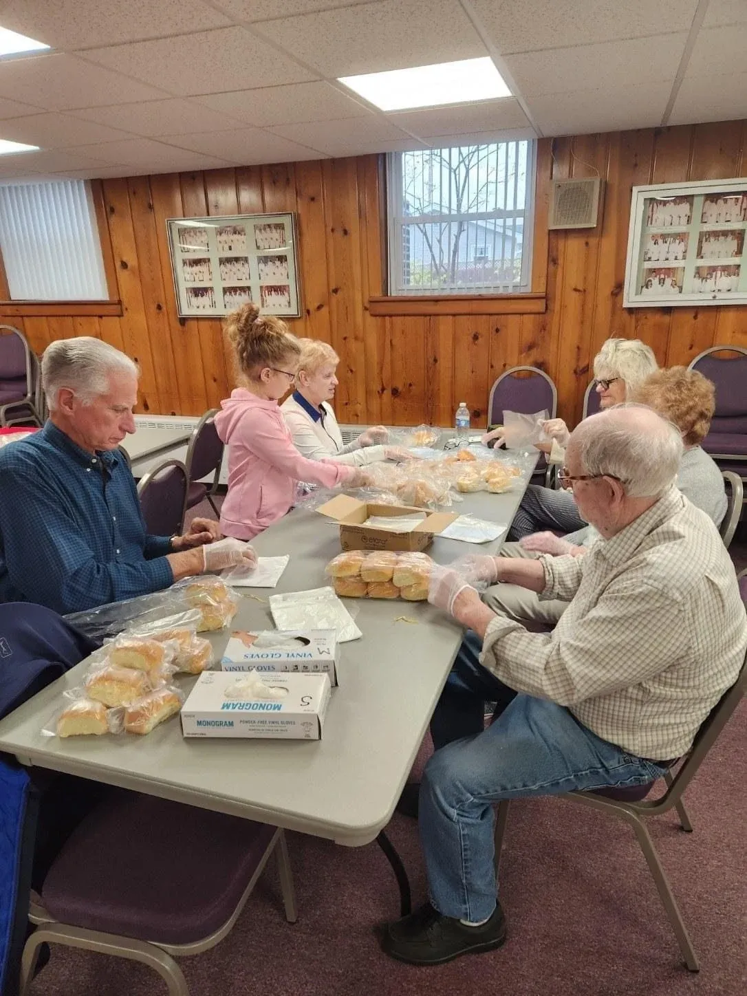 Church friends enjoying fellowship over a shared meal